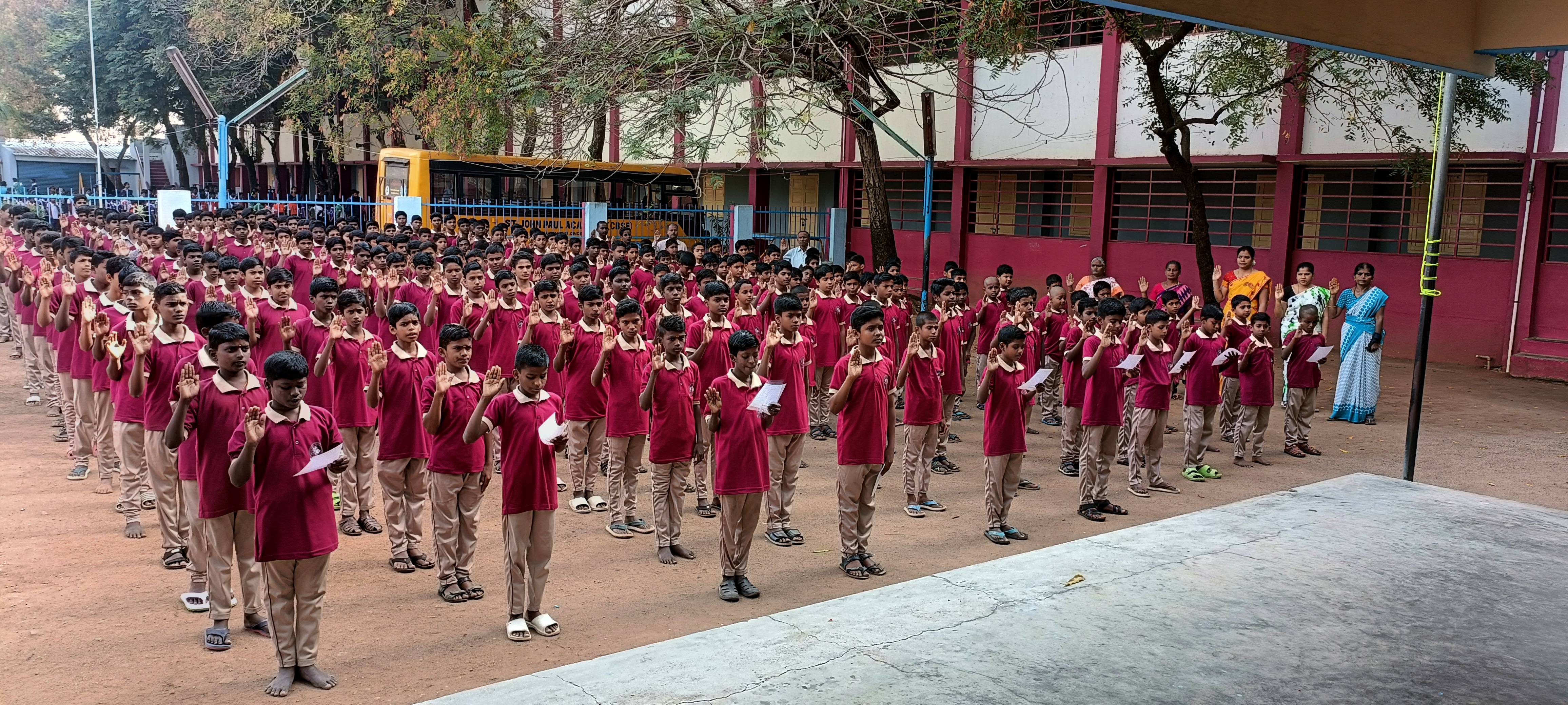 Students in morning prayer at John Paul School